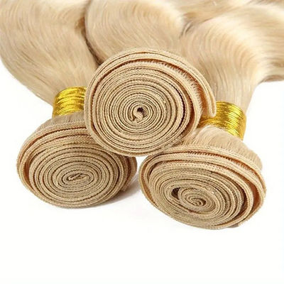 Paquet de cheveux humains brésiliens non transformés tissage et fermeture 613 Paquet de cheveux blonds couleur ODM