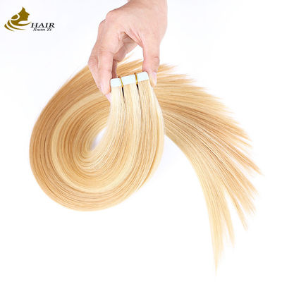 Les extensions de cheveux humains ondulés de couleur jaune