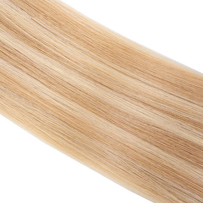 Les extensions de cheveux humains ondulés de couleur jaune