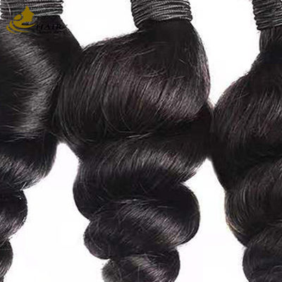 Ventes chaudes cheveux vierges brésiliens vague lâche boucles de cheveux humains