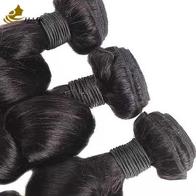 Ventes chaudes cheveux vierges brésiliens vague lâche boucles de cheveux humains